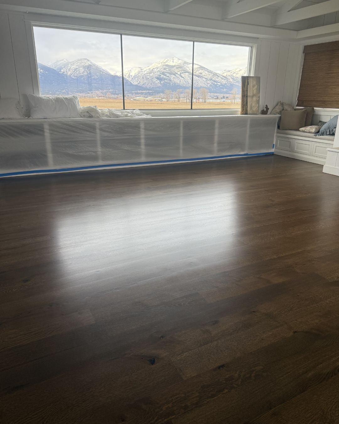 Wide-plank luxury vinyl flooring with subtle grain