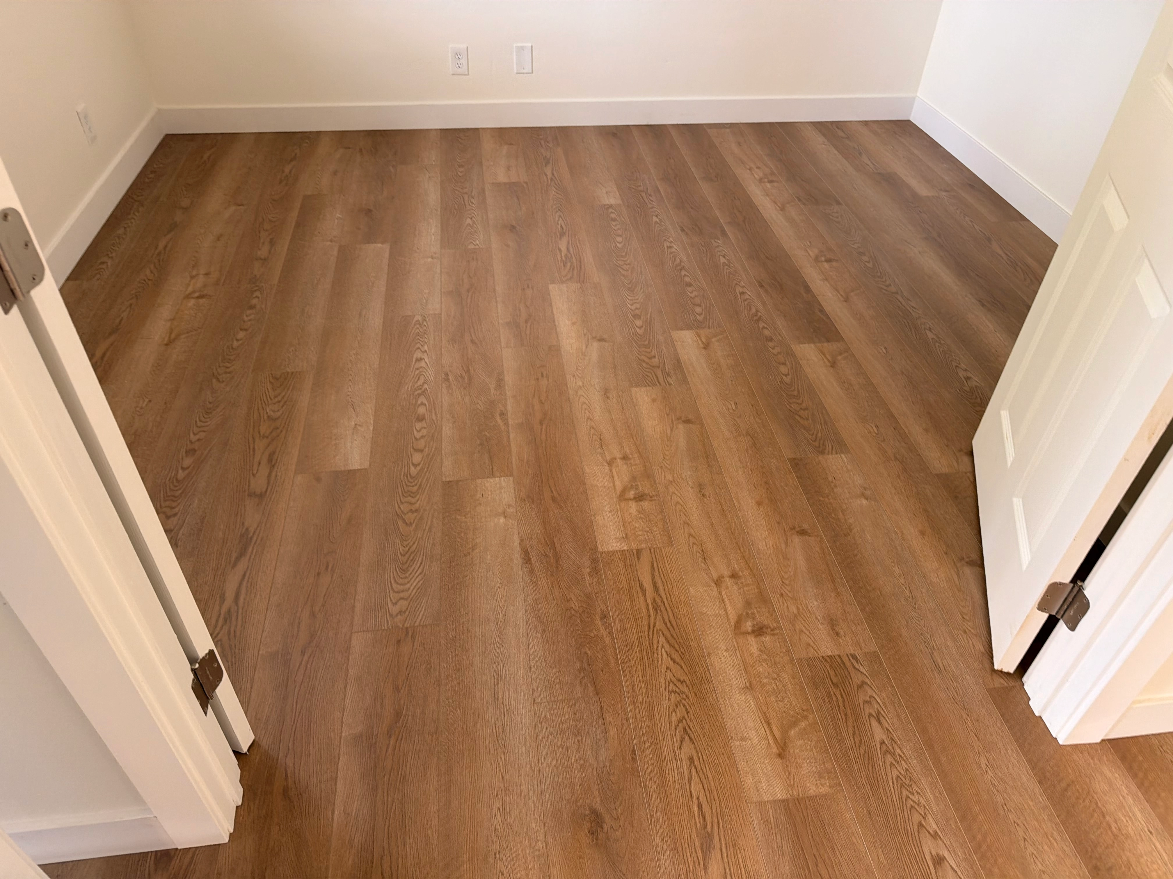 Comparing sheet vinyl and laminate sample boards