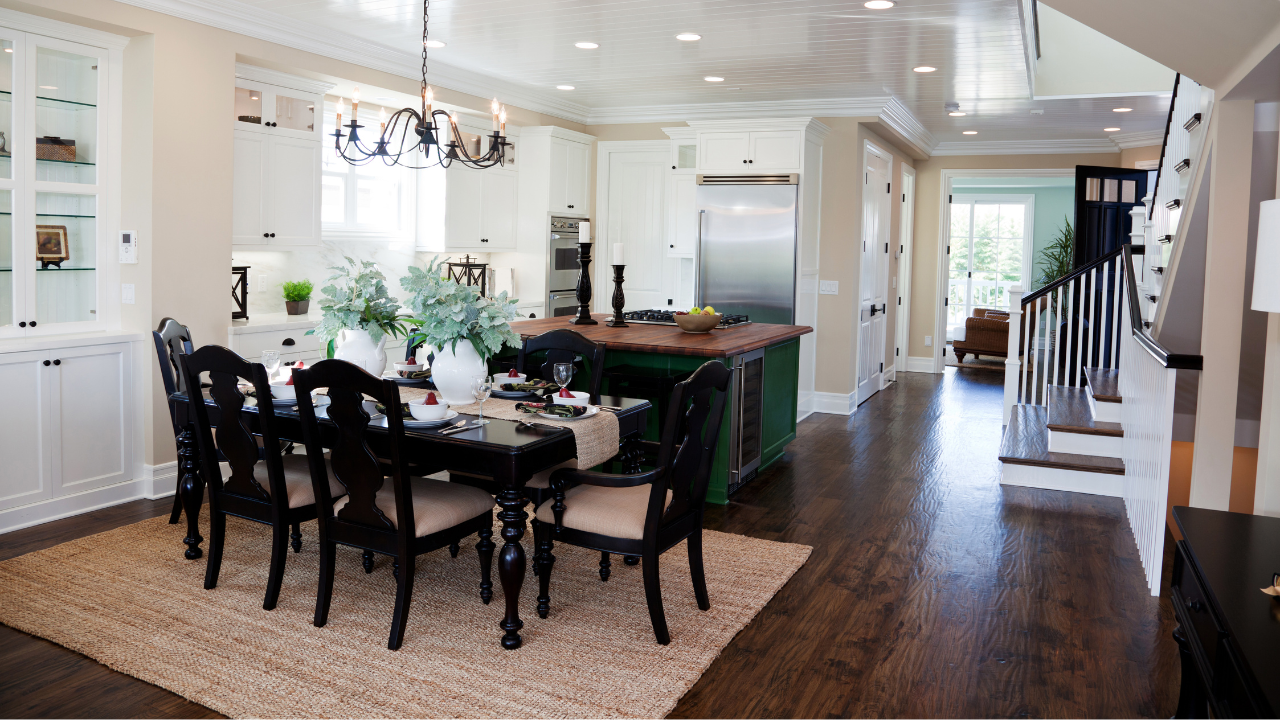 Laminate flooring extending through a kitchen and dining space